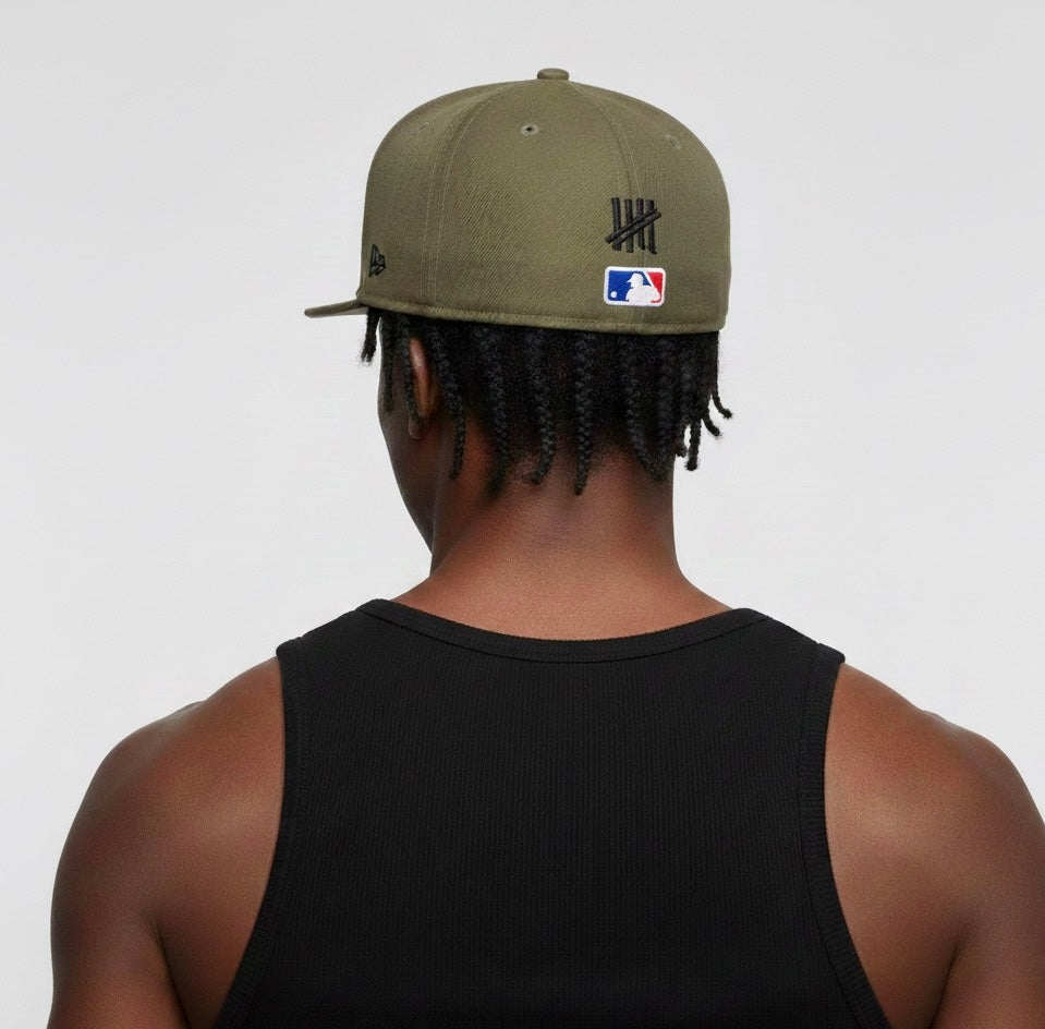 New York Yankees 59FIFTY fitted hat in an olive green