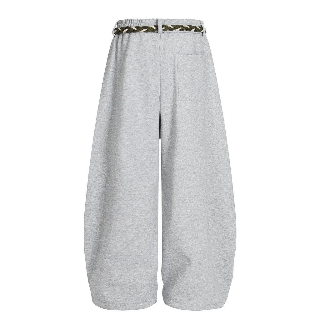 Baggy Sweatpants with unique braided rope belt with a red tassel