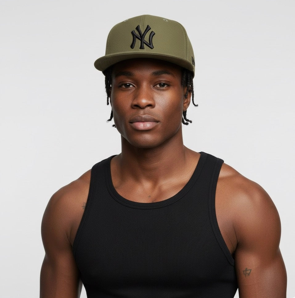 New York Yankees 59FIFTY fitted hat in an olive green