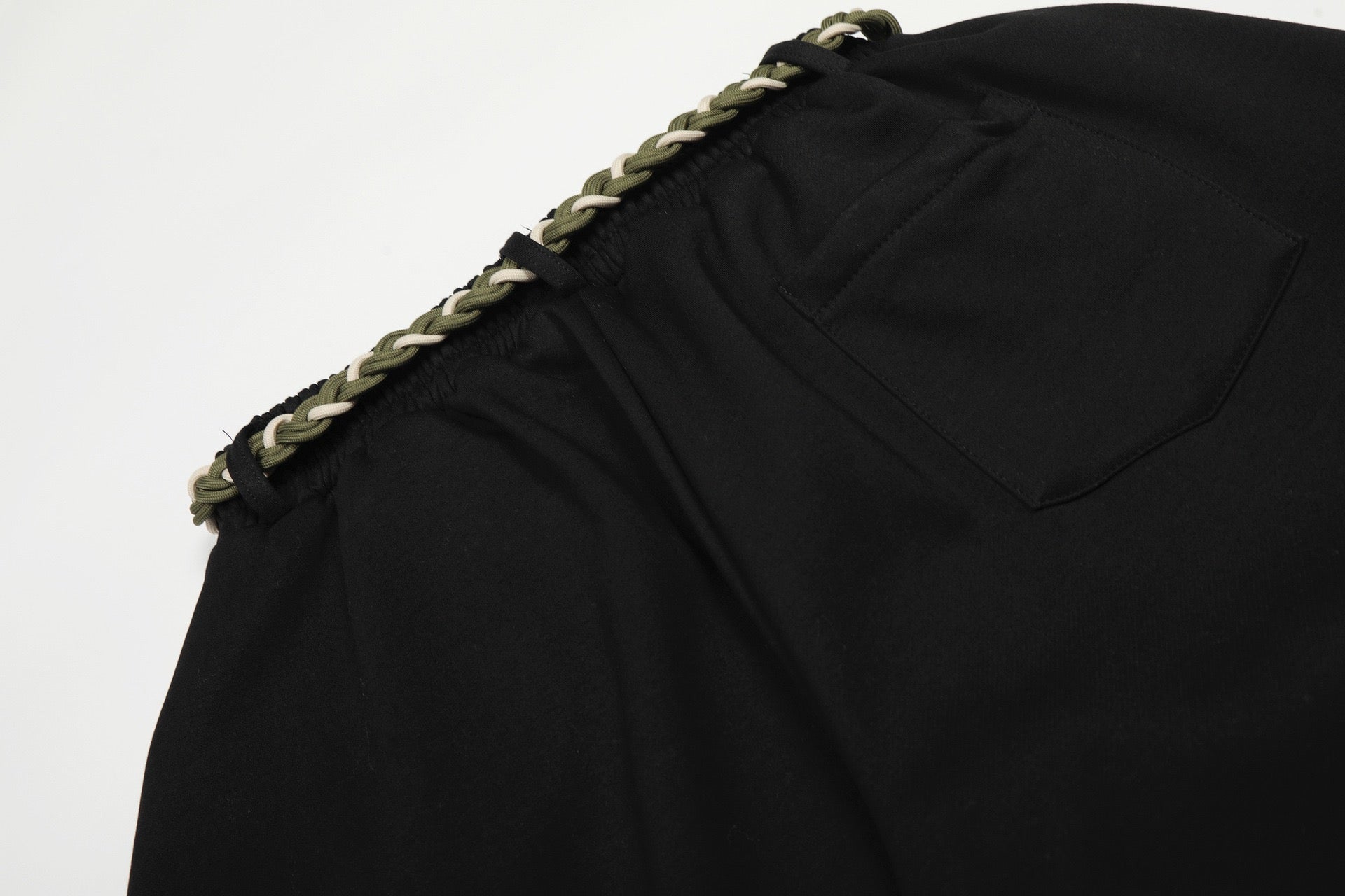 Baggy Sweatpants with unique braided rope belt with a red tassel