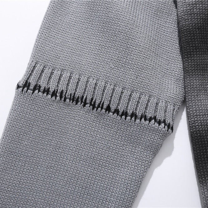 Ripped graffiti sweater