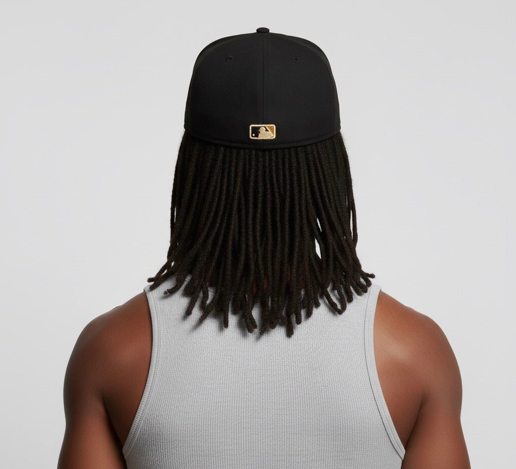 New Era 59Fifty x New York Yankees MLB fitted hat in black with a gold/yellow logo.