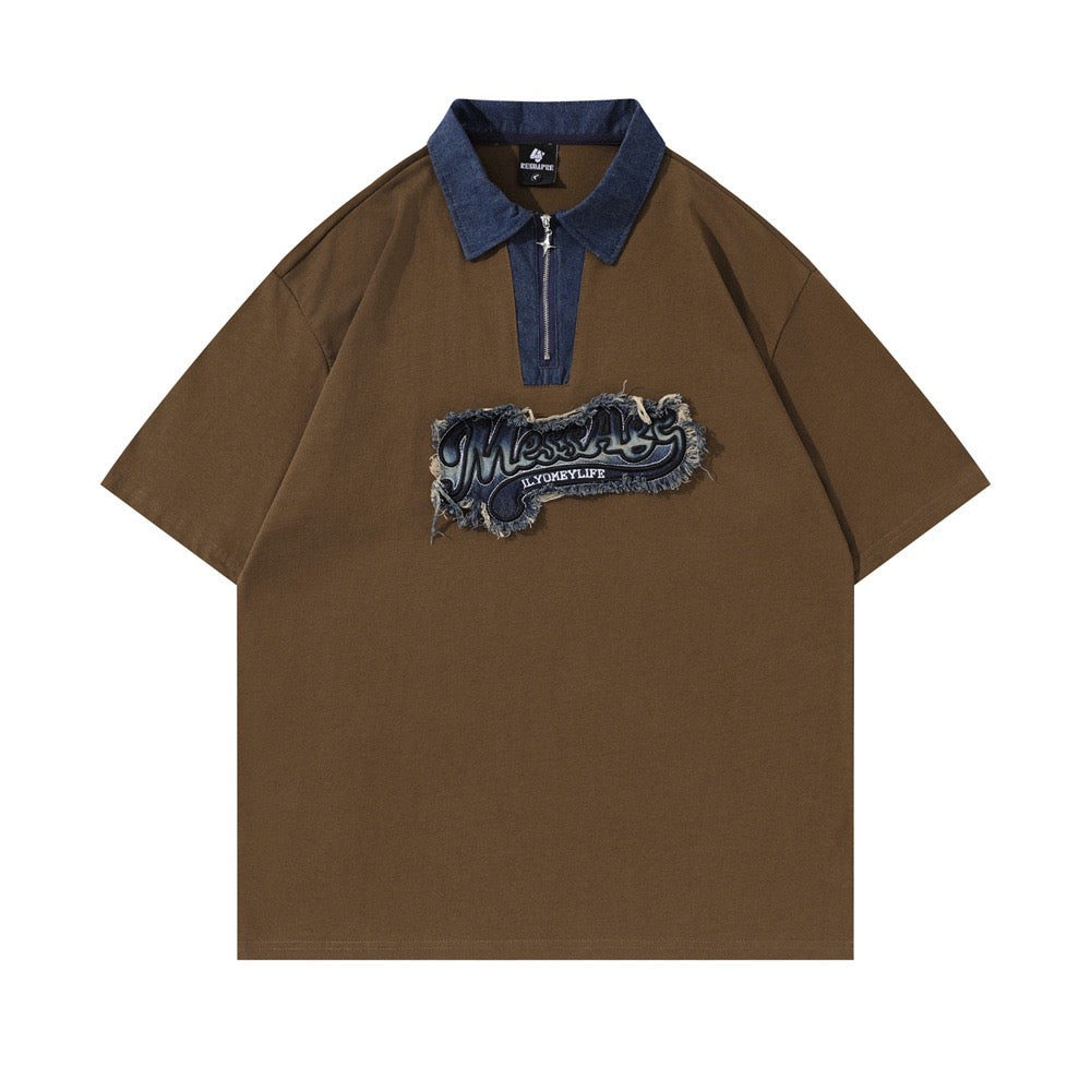 Short-sleeved polo shirt featuring a denim collar