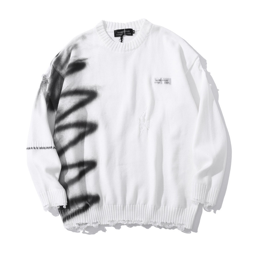 Ripped graffiti sweater