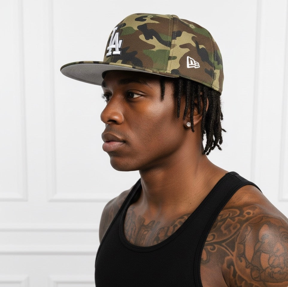 New Era Los Angeles Dodgers 9FIFTY snapback hat in a woodland camouflage pattern