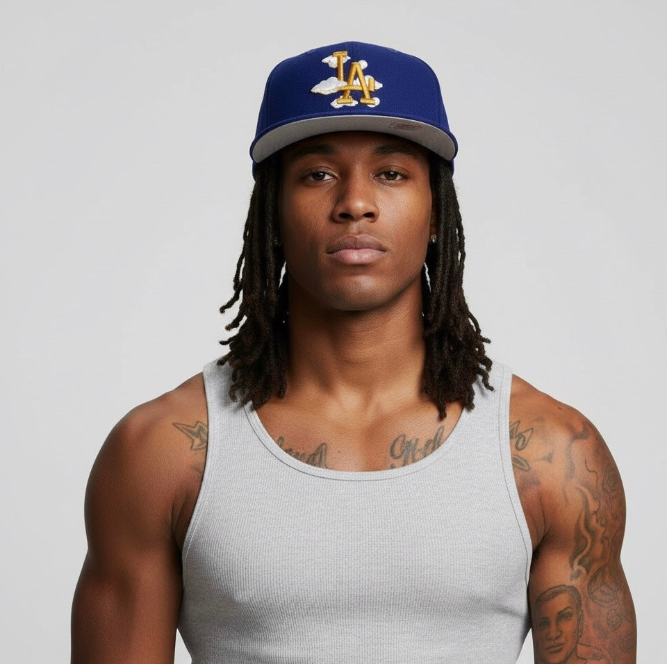 Los Angeles Dodgers New Era 59FIFTY fitted cap with a cloud and gold "LA" logo